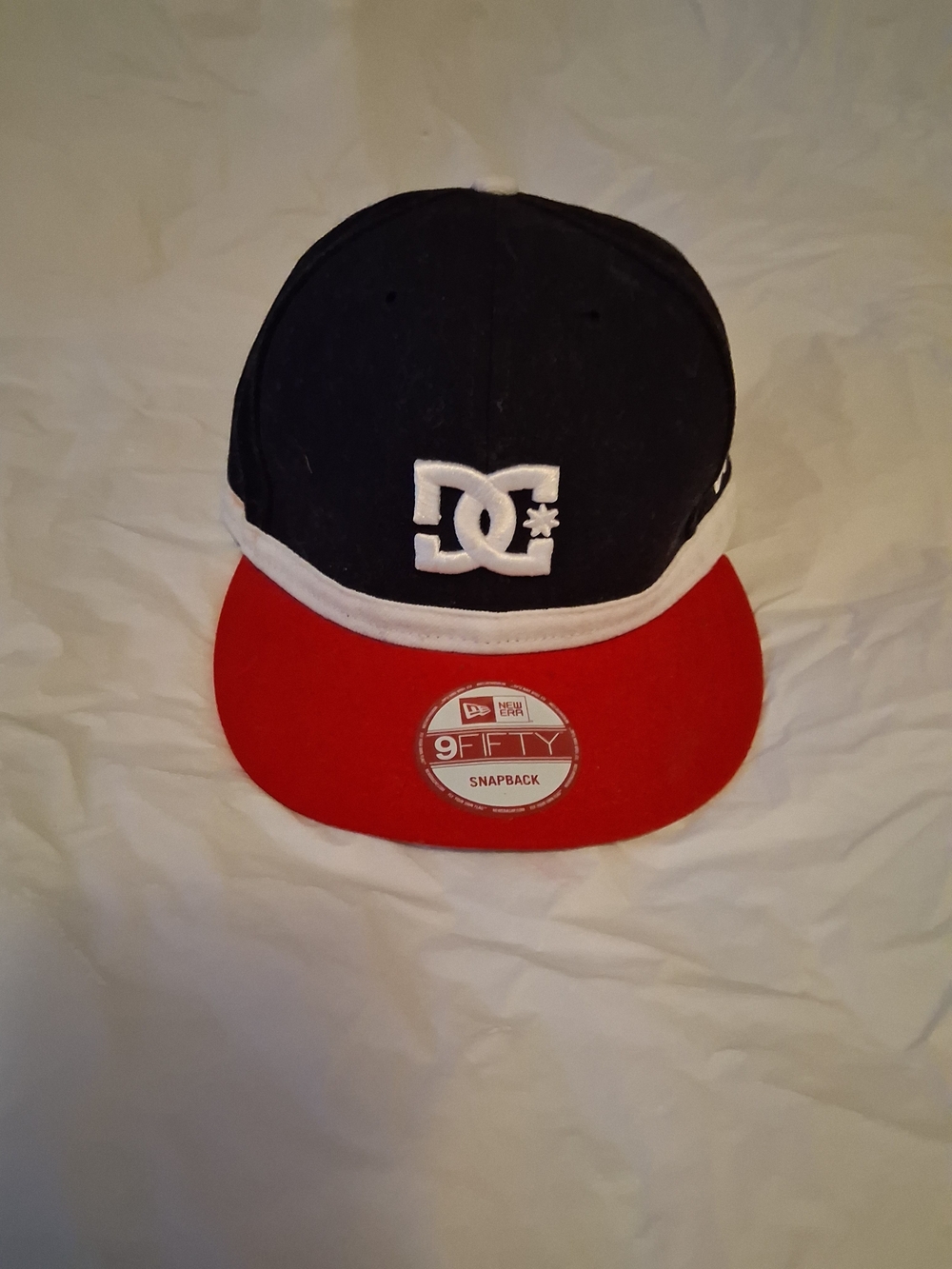 DC Black and Red Snapback Hat with White Logo